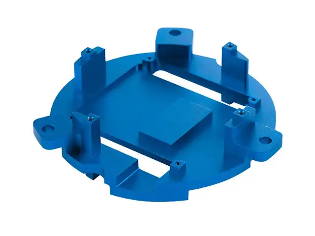 Blue-anodised aluminium mounting plate with milled bosses and pockets