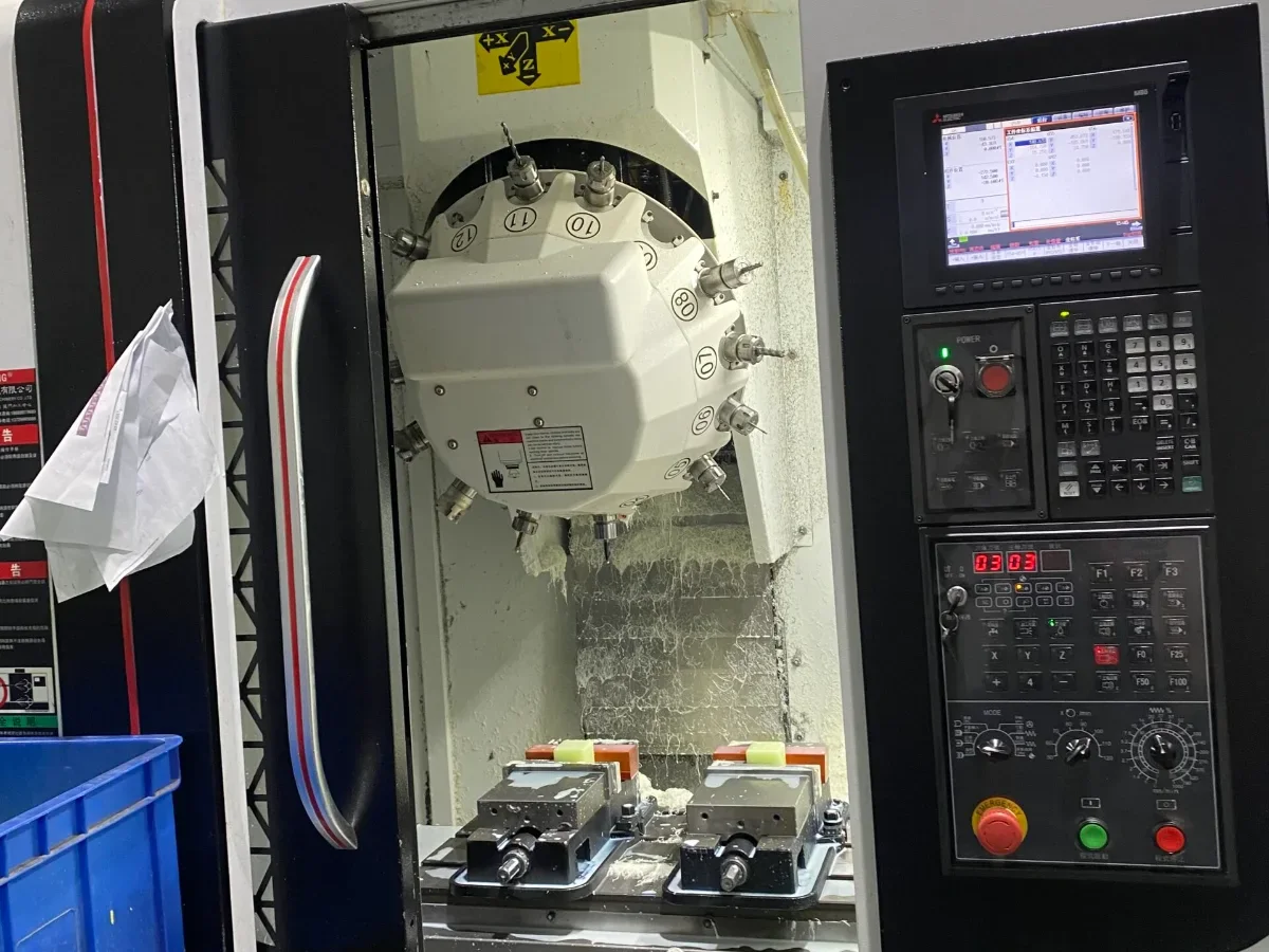 Vertical machining centre with tool changer and twin vises on the GY Machining shop floor